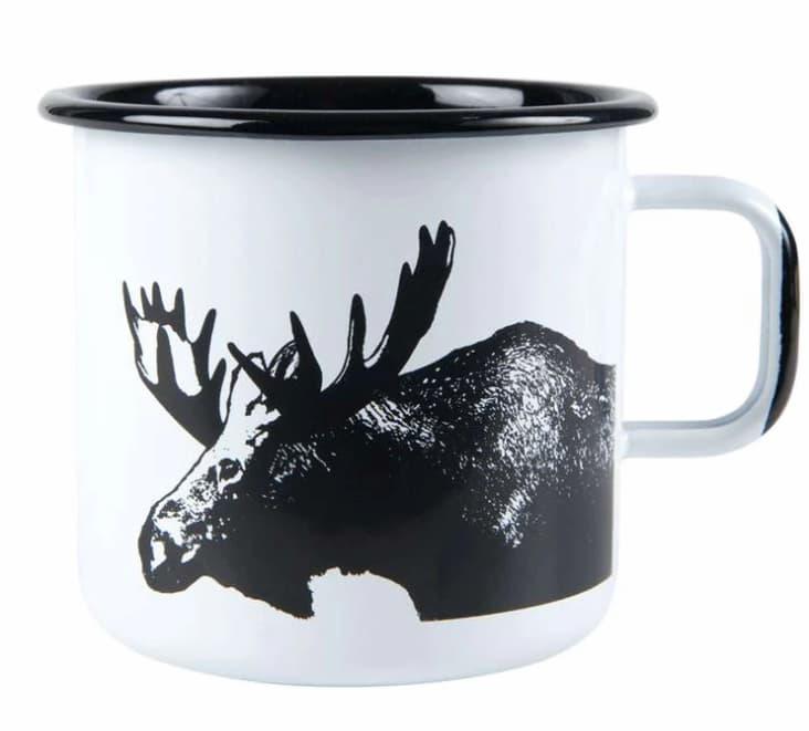 Emaljekopp test - emaljekopper med turkis farge på trebord